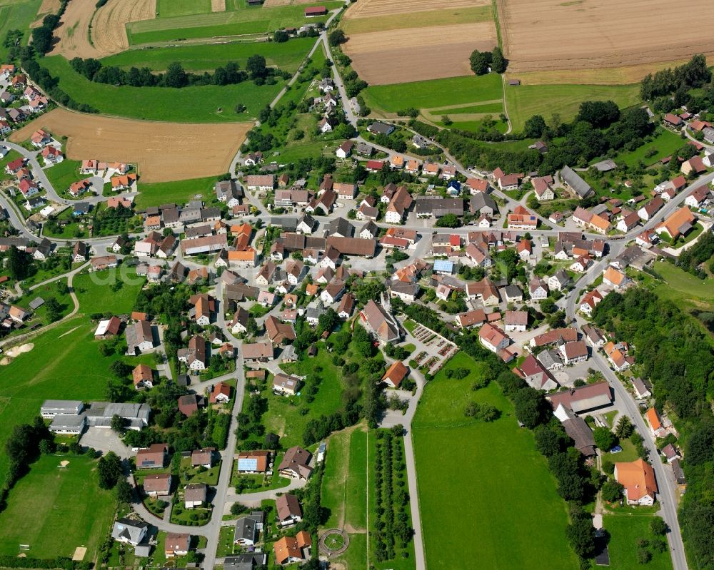 Marbach from the bird's eye view: Agricultural land and field boundaries surround the settlement area of the village in Marbach in the state Baden-Wuerttemberg, Germany