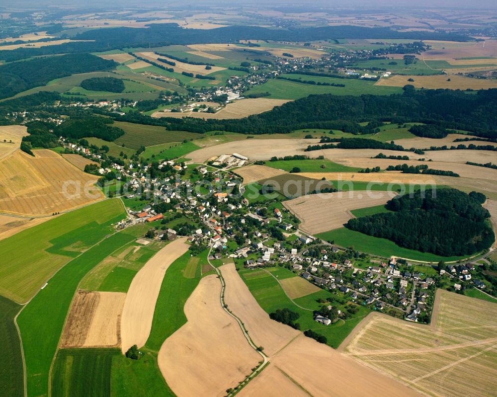 Marbach from the bird's eye view: Agricultural land and field boundaries surround the settlement area of the village in Marbach in the state Saxony, Germany