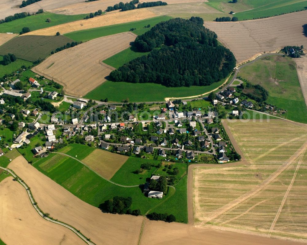 Aerial image Marbach - Agricultural land and field boundaries surround the settlement area of the village in Marbach in the state Saxony, Germany