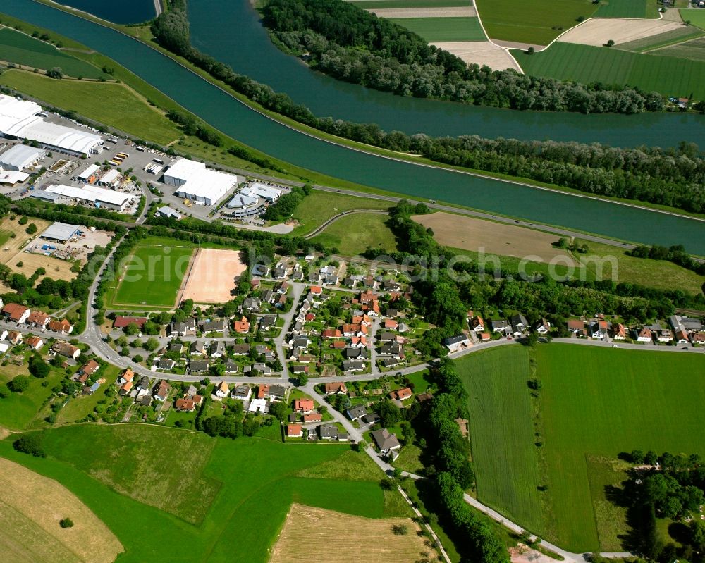 Metteberberg from above - Agricultural land and field boundaries surround the settlement area of the village in Metteberberg in the state Baden-Wuerttemberg, Germany