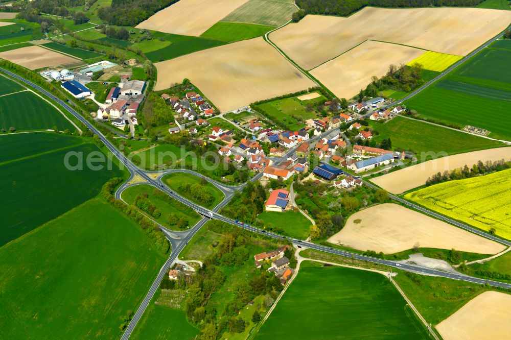 Neuses a.Sand from above - Agricultural land and field boundaries surround the settlement area of the village in Neuses a.Sand in the state Bavaria, Germany