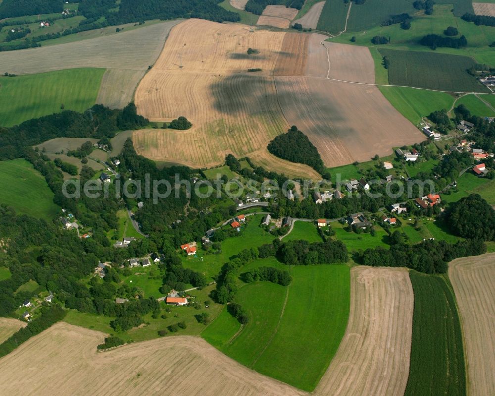 Niederbobritzsch from the bird's eye view: Agricultural land and field boundaries surround the settlement area of the village in Niederbobritzsch in the state Saxony, Germany