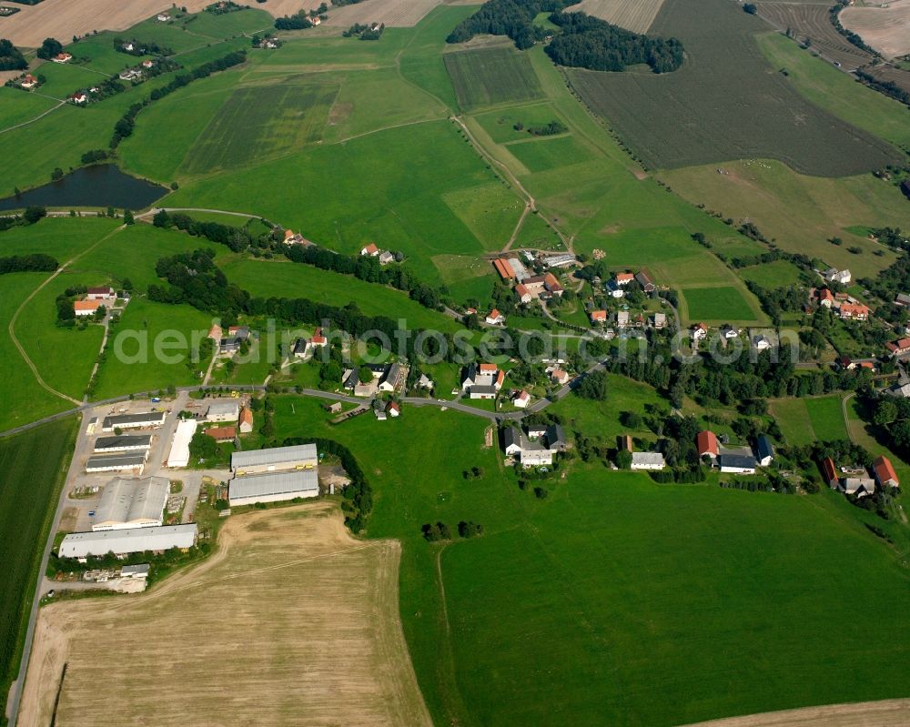 Aerial image Niederschöna - Agricultural land and field boundaries surround the settlement area of the village in Niederschöna in the state Saxony, Germany