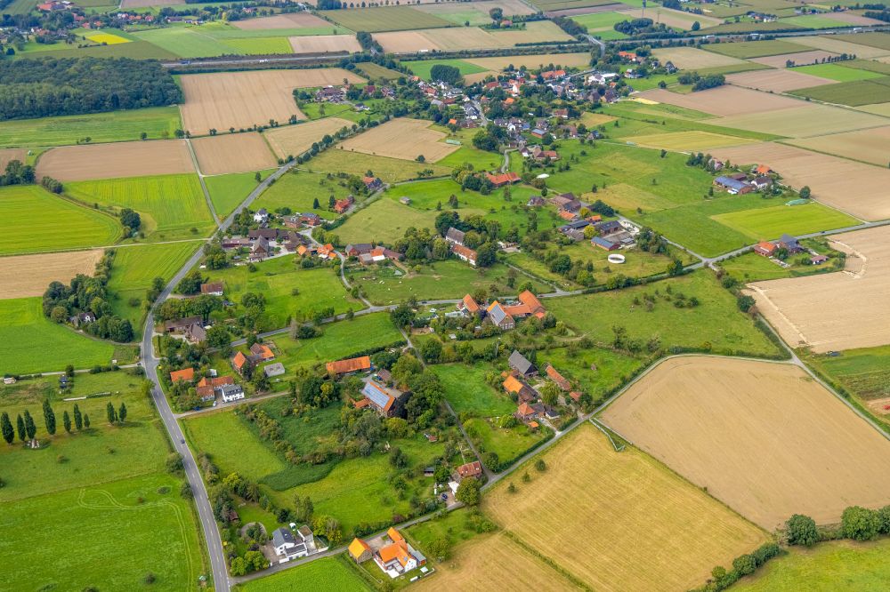 Norddinker from above - Agricultural land and field boundaries surround the settlement area of the village in Norddinker at Ruhrgebiet in the state North Rhine-Westphalia, Germany