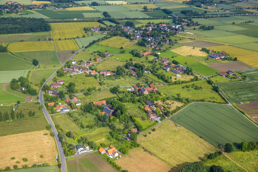 Aerial image Norddinker - Agricultural land and field boundaries surround the settlement area of the village in Norddinker at Ruhrgebiet in the state North Rhine-Westphalia, Germany
