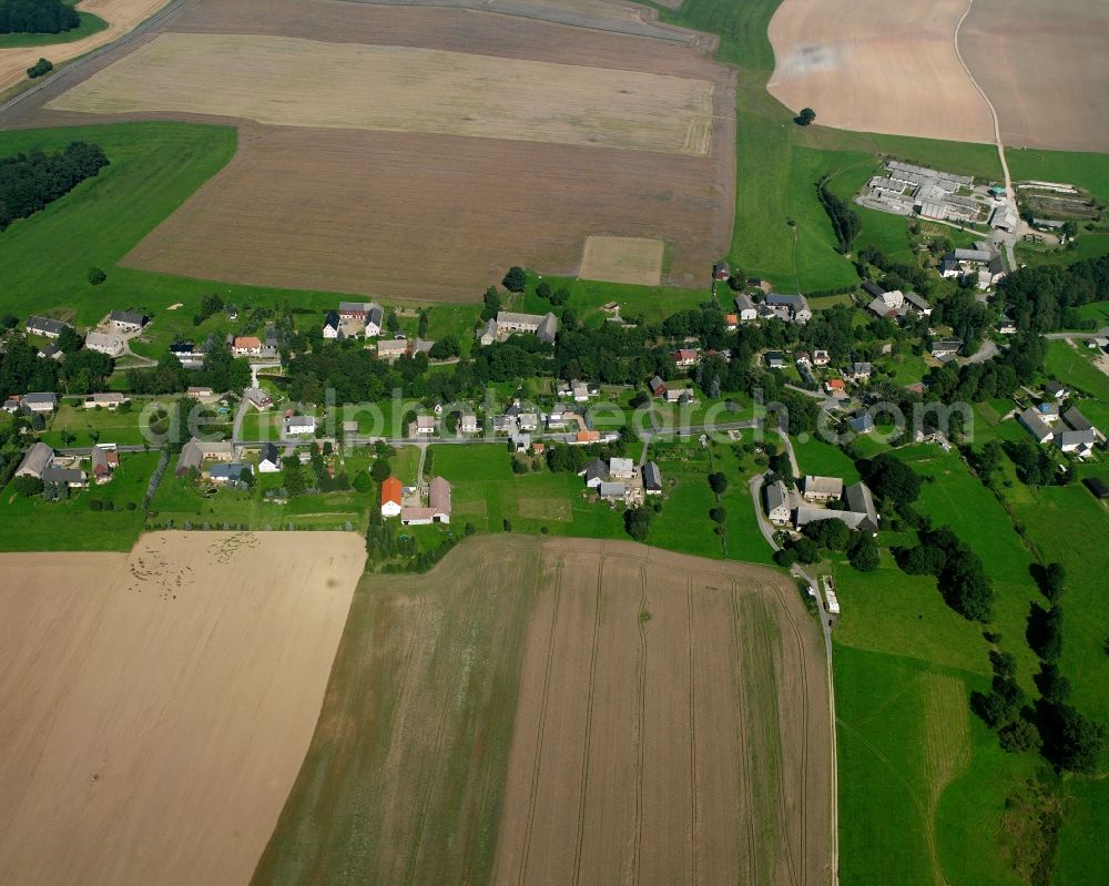 Oberbobritzsch from above - Agricultural land and field boundaries surround the settlement area of the village in Oberbobritzsch in the state Saxony, Germany