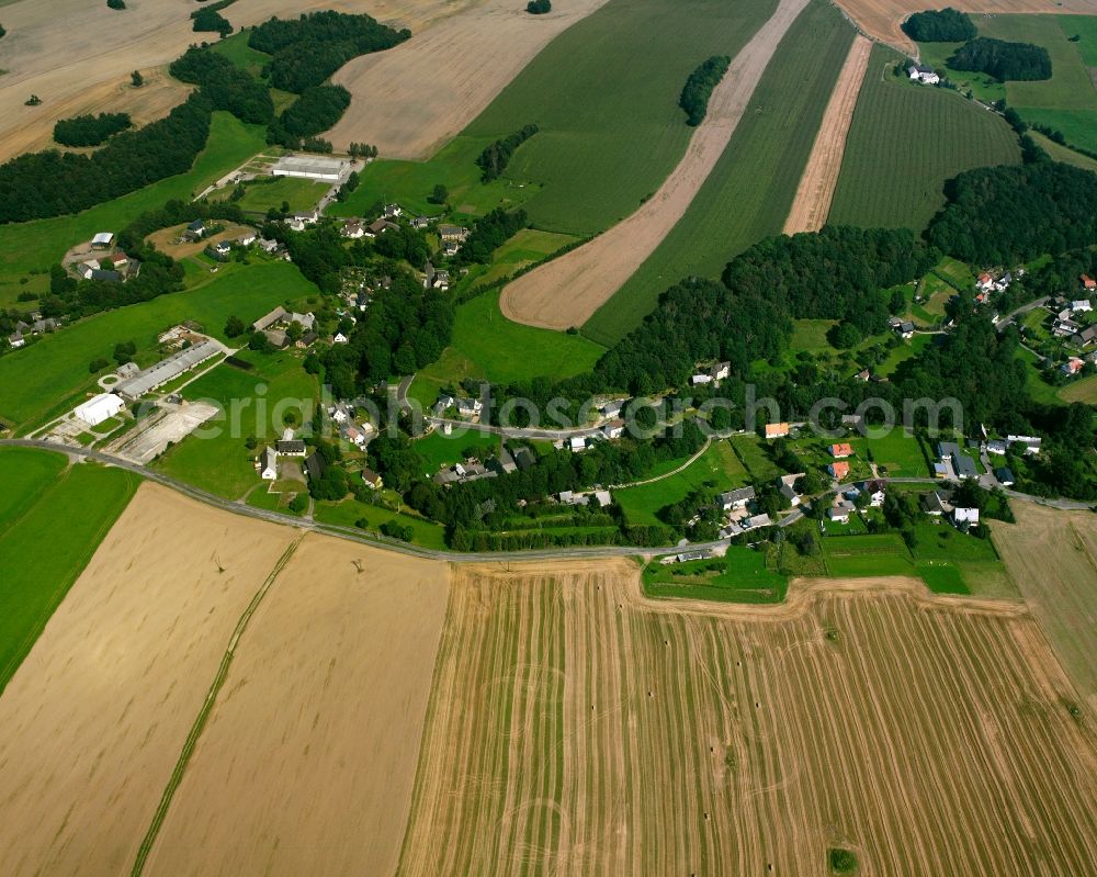 Oberbobritzsch from the bird's eye view: Agricultural land and field boundaries surround the settlement area of the village in Oberbobritzsch in the state Saxony, Germany
