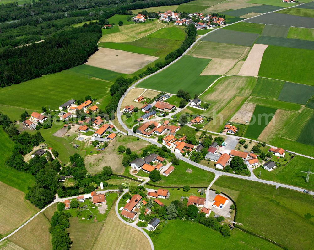 Aerial image Oberholzhausen - Agricultural land and field boundaries surround the settlement area of the village in Oberholzhausen in the state Bavaria, Germany