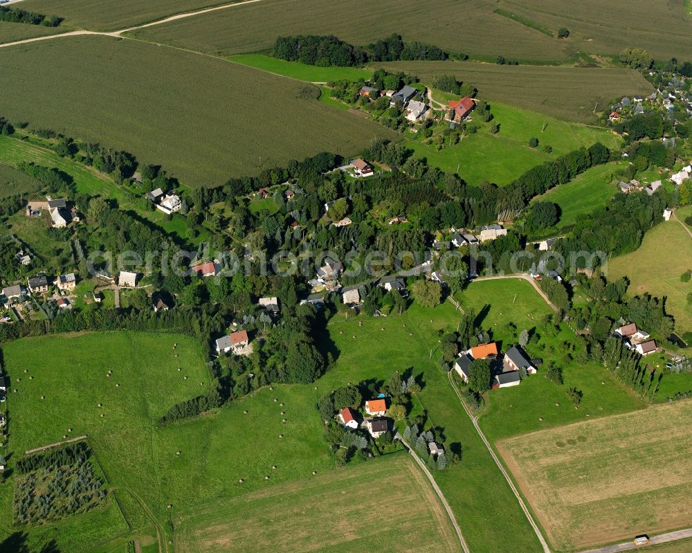 Aerial image Oberlichtenau - Agricultural land and field boundaries surround the settlement area of the village in Oberlichtenau in the state Saxony, Germany