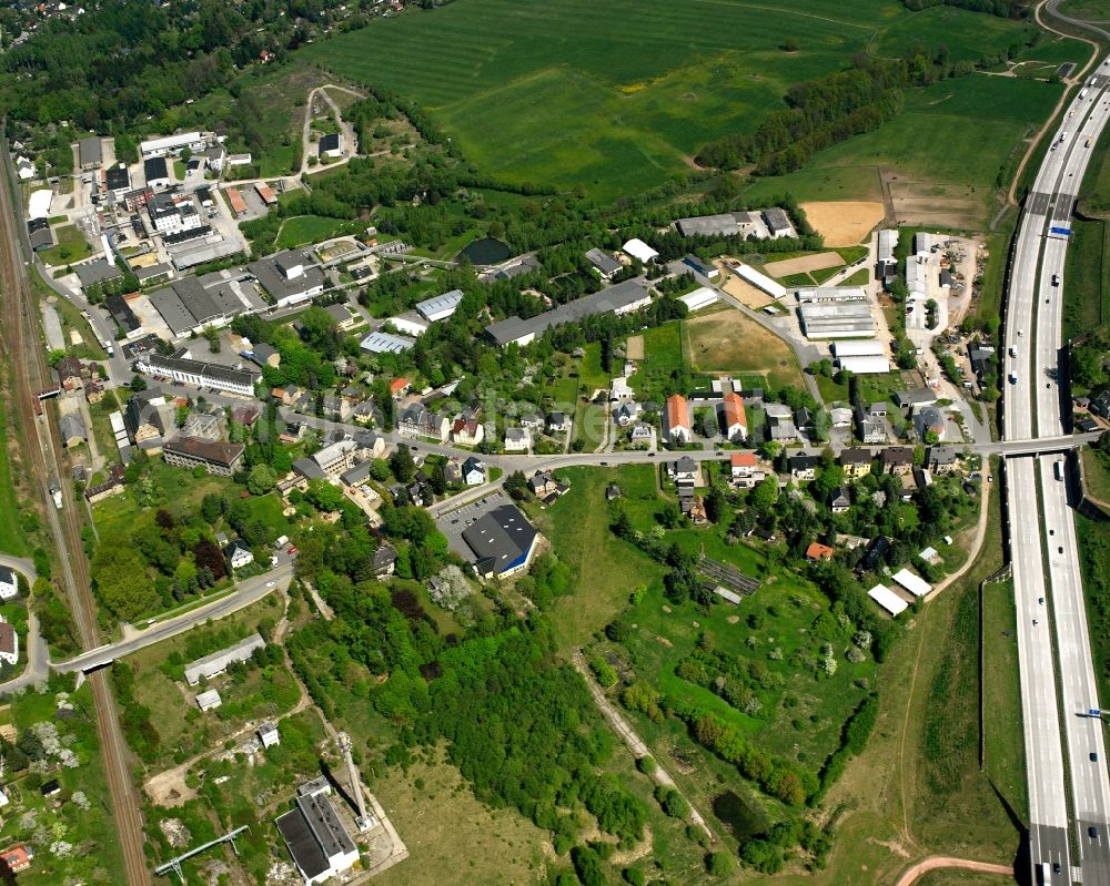 Oberlichtenau from the bird's eye view: Agricultural land and field boundaries surround the settlement area of the village in Oberlichtenau in the state Saxony, Germany