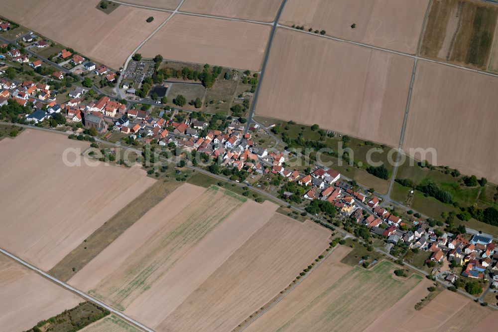 Aerial image Oberndorf - Agricultural land and field boundaries surround the settlement area of the village in Oberndorf in the state Bavaria, Germany