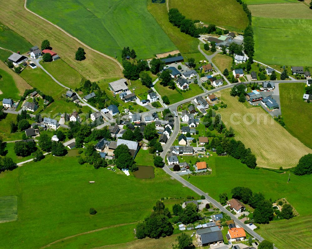Obersteben from above - Agricultural land and field boundaries surround the settlement area of the village in Obersteben in the state Bavaria, Germany
