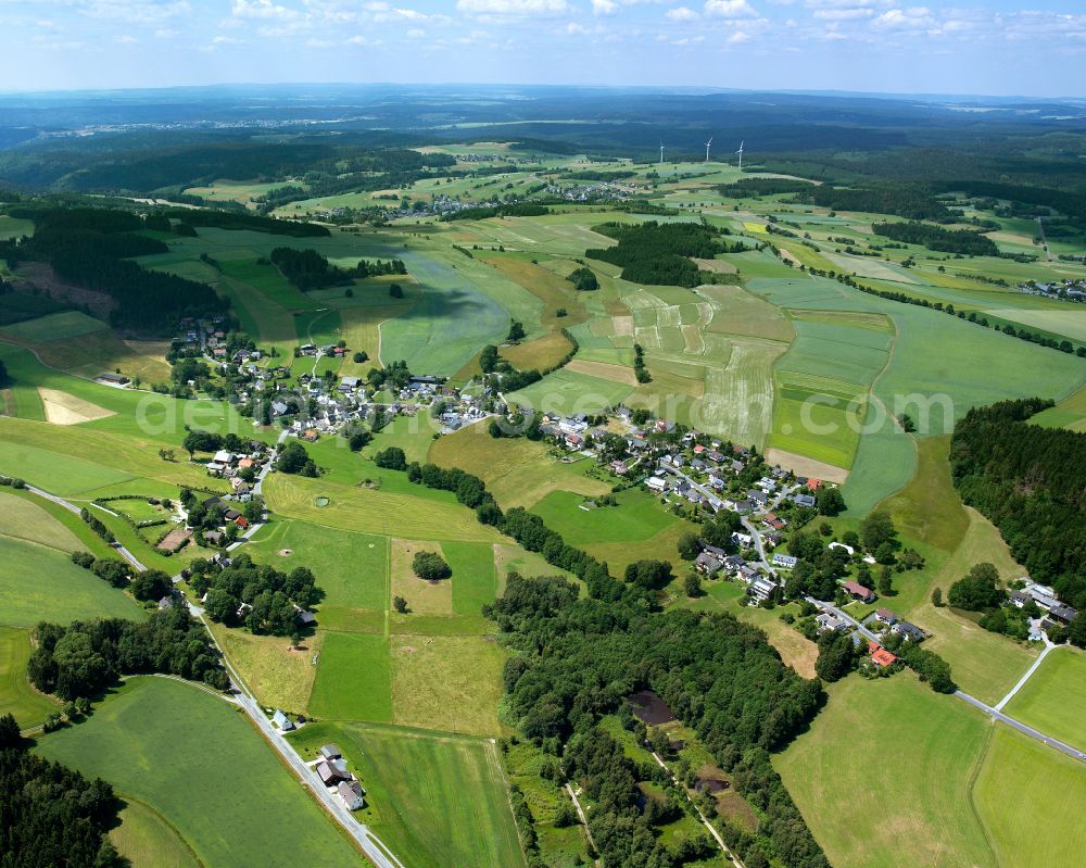Aerial image Obersteben - Agricultural land and field boundaries surround the settlement area of the village in Obersteben in the state Bavaria, Germany