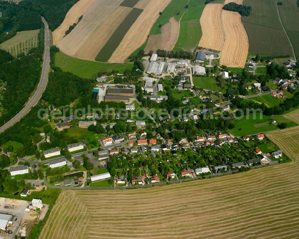Aerial image Oederan - Agricultural land and field boundaries surround the settlement area of the village in Oederan in the state Saxony, Germany