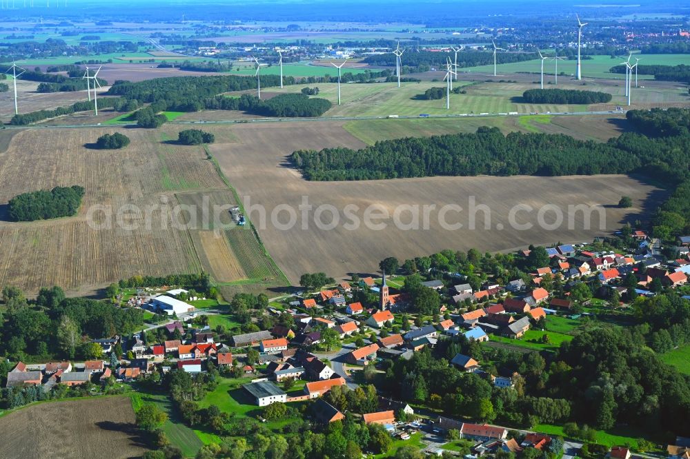 Papenbruch from the bird's eye view: Agricultural land and field boundaries surround the settlement area of the village in Papenbruch in the state Brandenburg, Germany