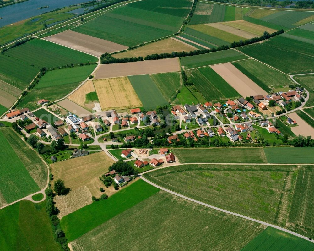 Pittrich from the bird's eye view: Agricultural land and field boundaries surround the settlement area of the village in Pittrich in the state Bavaria, Germany