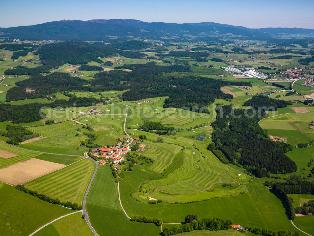 Aerial image Poppenreut - Agricultural land and field boundaries surround the settlement area of the village in Poppenreut in the state Bavaria, Germany