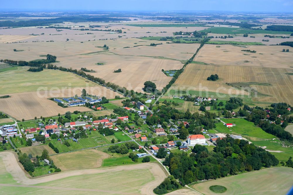 Aerial image Quadenschönfeld - Agricultural land and field boundaries surround the settlement area of the village in Quadenschoenfeld in the state Mecklenburg - Western Pomerania, Germany