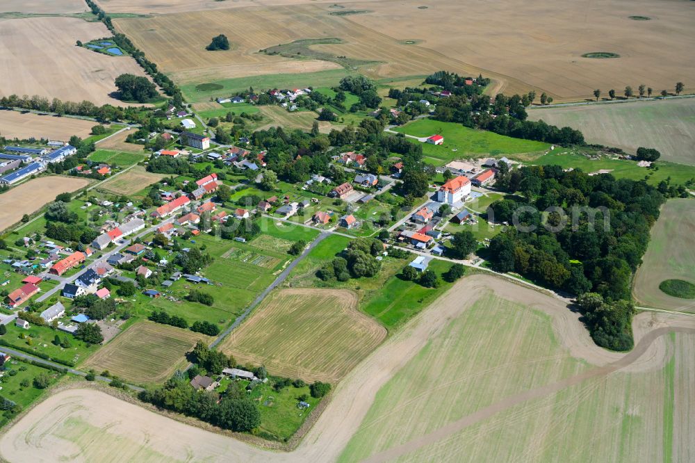 Quadenschönfeld from above - Agricultural land and field boundaries surround the settlement area of the village in Quadenschoenfeld in the state Mecklenburg - Western Pomerania, Germany