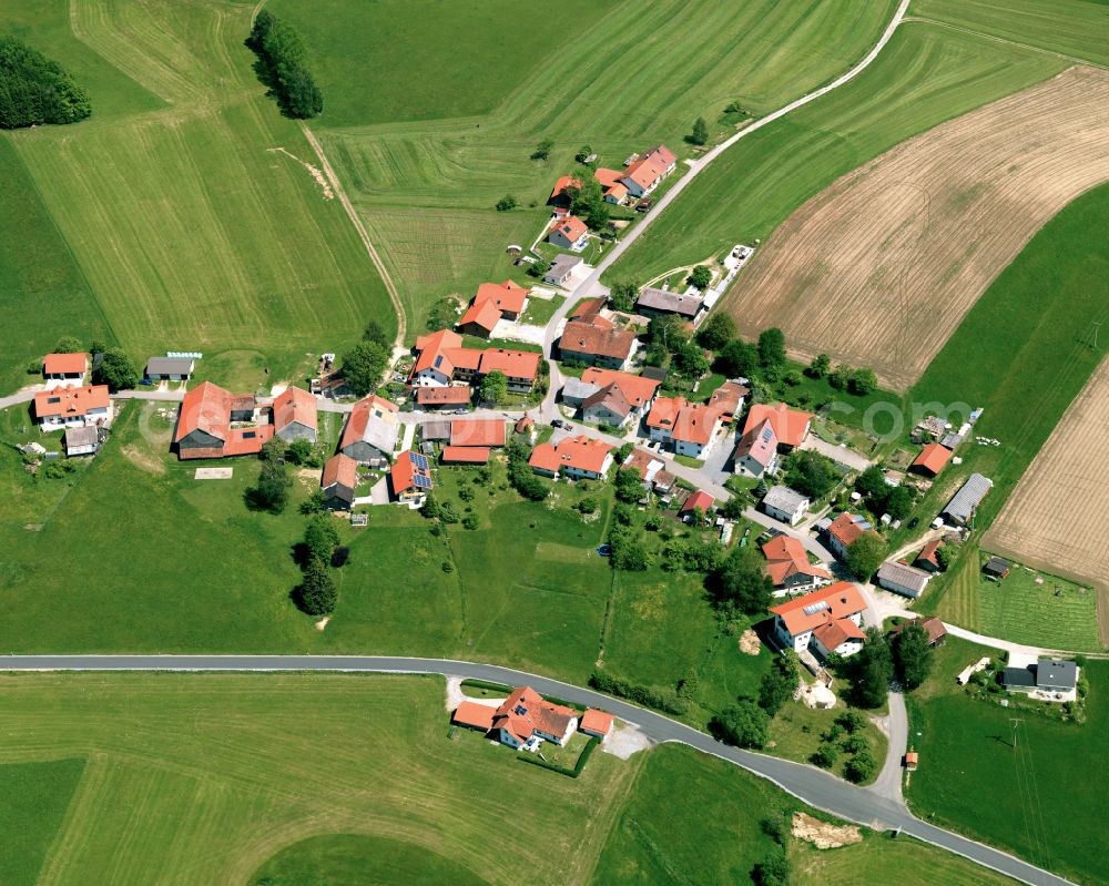 Reichling from the bird's eye view: Agricultural land and field boundaries surround the settlement area of the village in Reichling in the state Bavaria, Germany