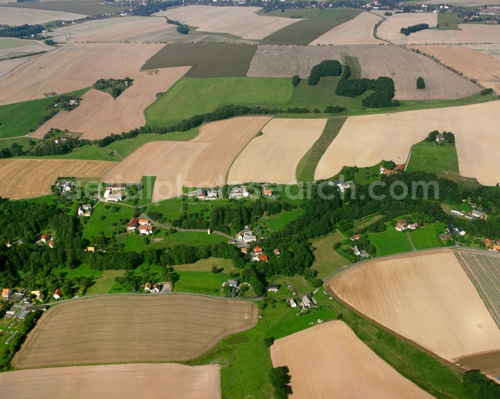 Aerial image Reinsberg - Agricultural land and field boundaries surround the settlement area of the village in Reinsberg in the state Saxony, Germany