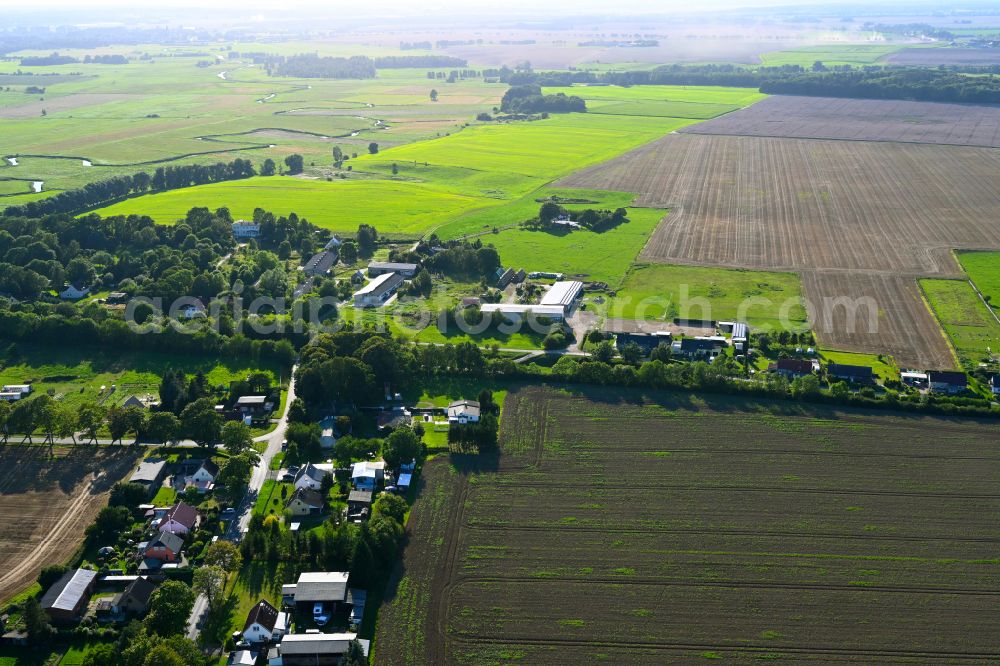 Rekentin from above - Agricultural land and field boundaries surround the settlement area of the village on street Kastanienweg in Rekentin in the state Mecklenburg - Western Pomerania, Germany