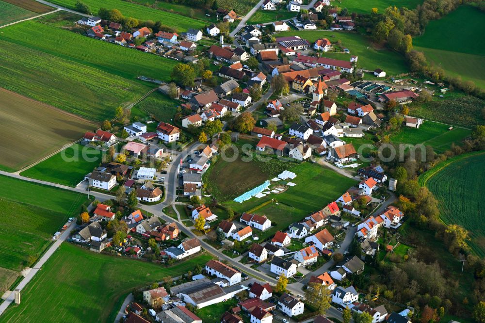Richtheim from the bird's eye view: Agricultural land and field boundaries surround the settlement area of the village in Richtheim in the state Bavaria, Germany