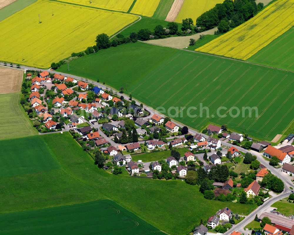 Aerial photograph Rindenmoos - Agricultural land and field boundaries surround the settlement area of the village in Rindenmoos in the state Baden-Wuerttemberg, Germany