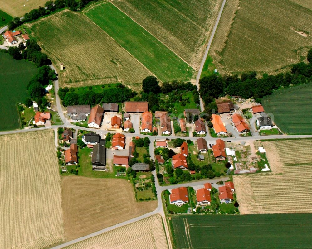 Roith from above - Agricultural land and field boundaries surround the settlement area of the village in Roith in the state Bavaria, Germany