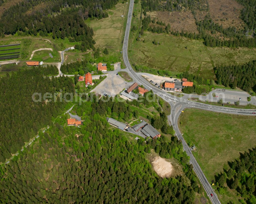 Aerial image Sankt Andreasberg - Agricultural land and field boundaries surround the settlement area of the village in Sankt Andreasberg in the state Lower Saxony, Germany