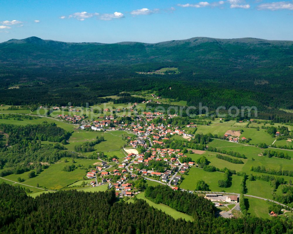 Sankt Oswald from above - Agricultural land and field boundaries surround the settlement area of the village in Sankt Oswald in the state Bavaria, Germany