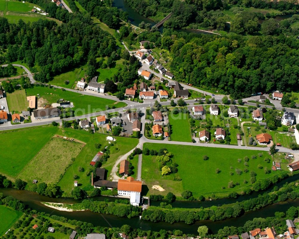 Scheer from above - Agricultural land and field boundaries surround the settlement area of the village in Scheer in the state Baden-Wuerttemberg, Germany