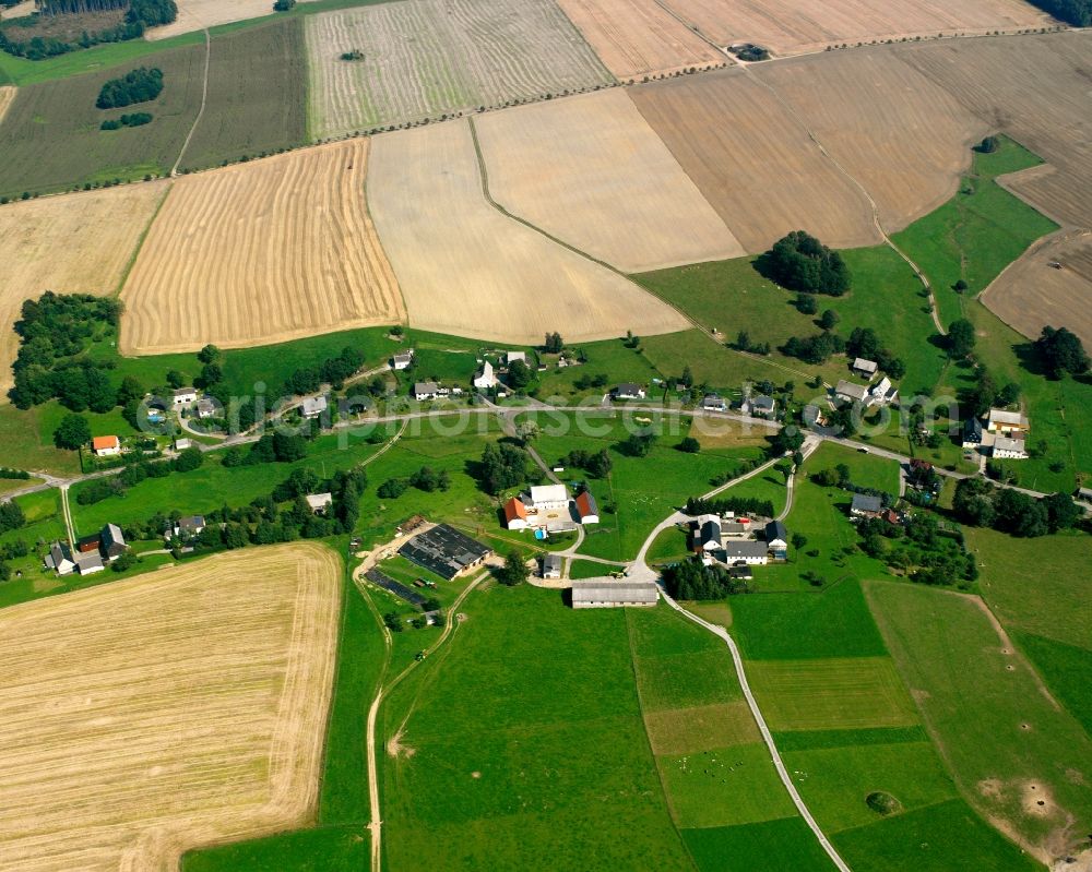 Aerial image Schönerstadt - Agricultural land and field boundaries surround the settlement area of the village in Schönerstadt in the state Saxony, Germany