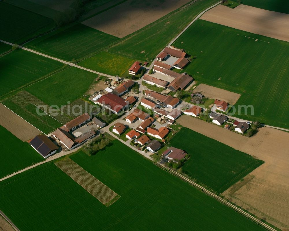Seibersdorf from above - Agricultural land and field boundaries surround the settlement area of the village in Seibersdorf in the state Bavaria, Germany