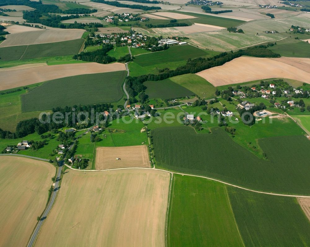 Seitenhain from above - Agricultural land and field boundaries surround the settlement area of the village in Seitenhain in the state Saxony, Germany