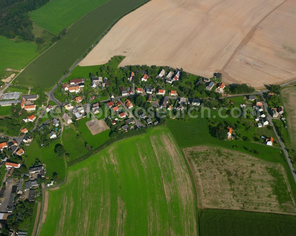 Aerial photograph Siebenlehn - Agricultural land and field boundaries surround the settlement area of the village in Siebenlehn in the state Saxony, Germany