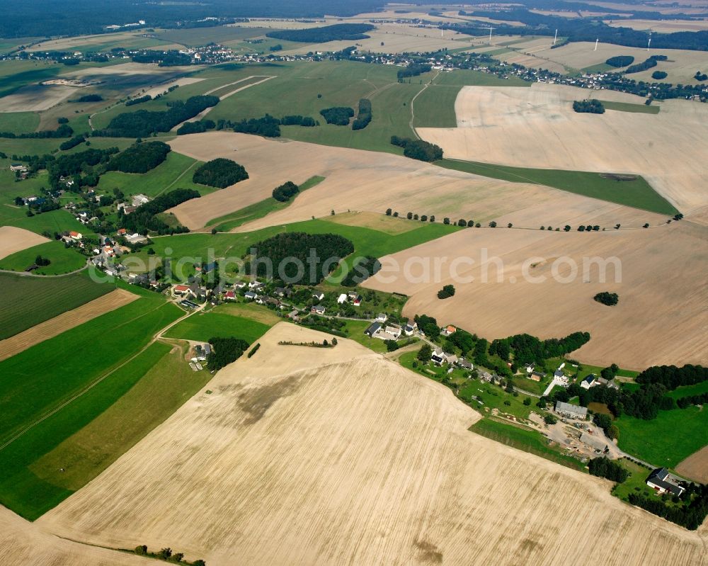 Aerial photograph Sohra - Agricultural land and field boundaries surround the settlement area of the village in Sohra in the state Saxony, Germany