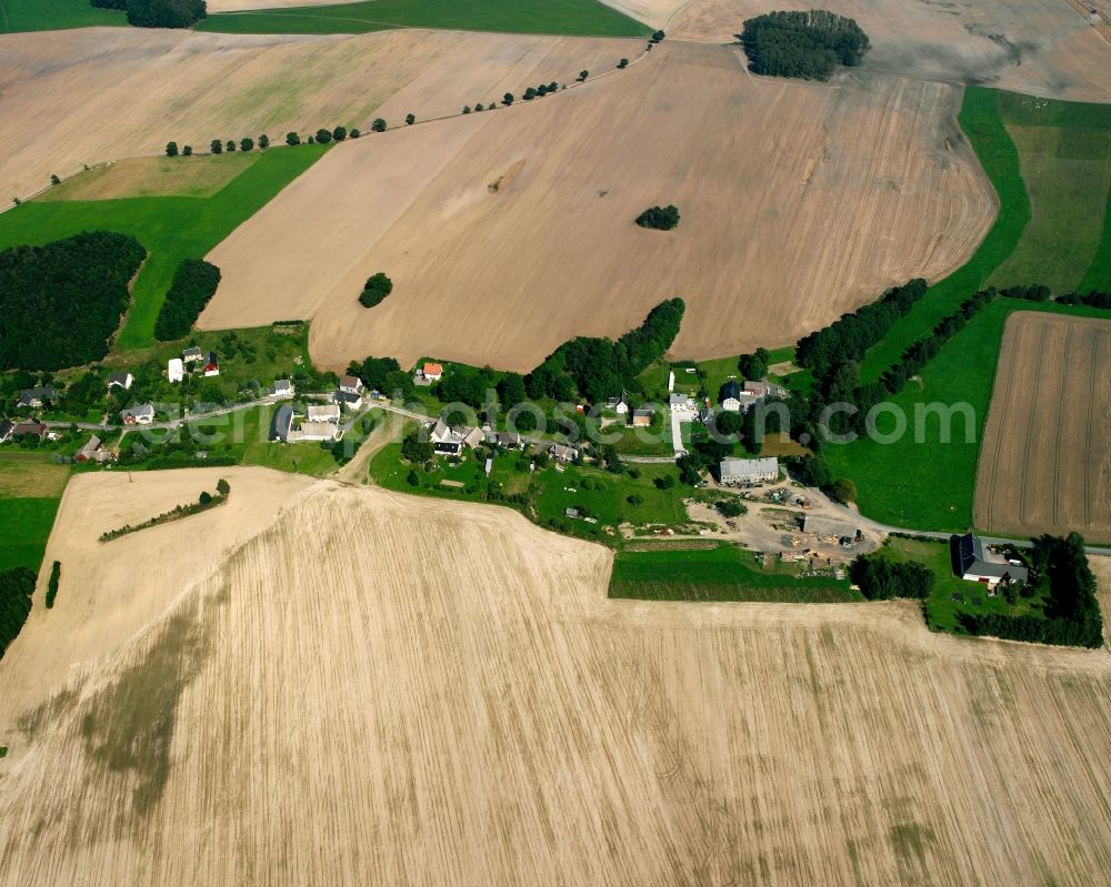 Sohra from above - Agricultural land and field boundaries surround the settlement area of the village in Sohra in the state Saxony, Germany
