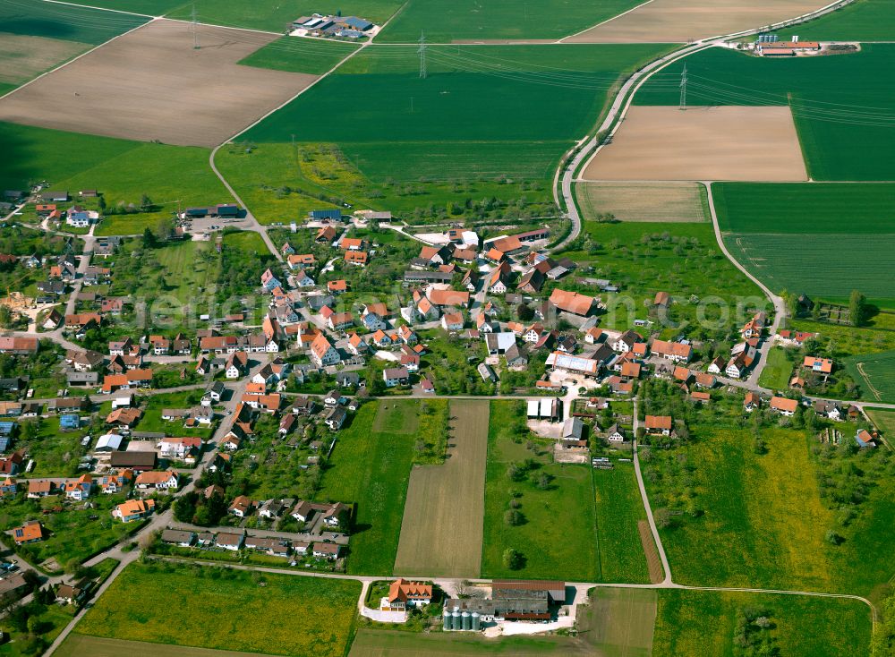 Sonderbuch from the bird's eye view: Agricultural land and field boundaries surround the settlement area of the village in Sonderbuch in the state Baden-Wuerttemberg, Germany