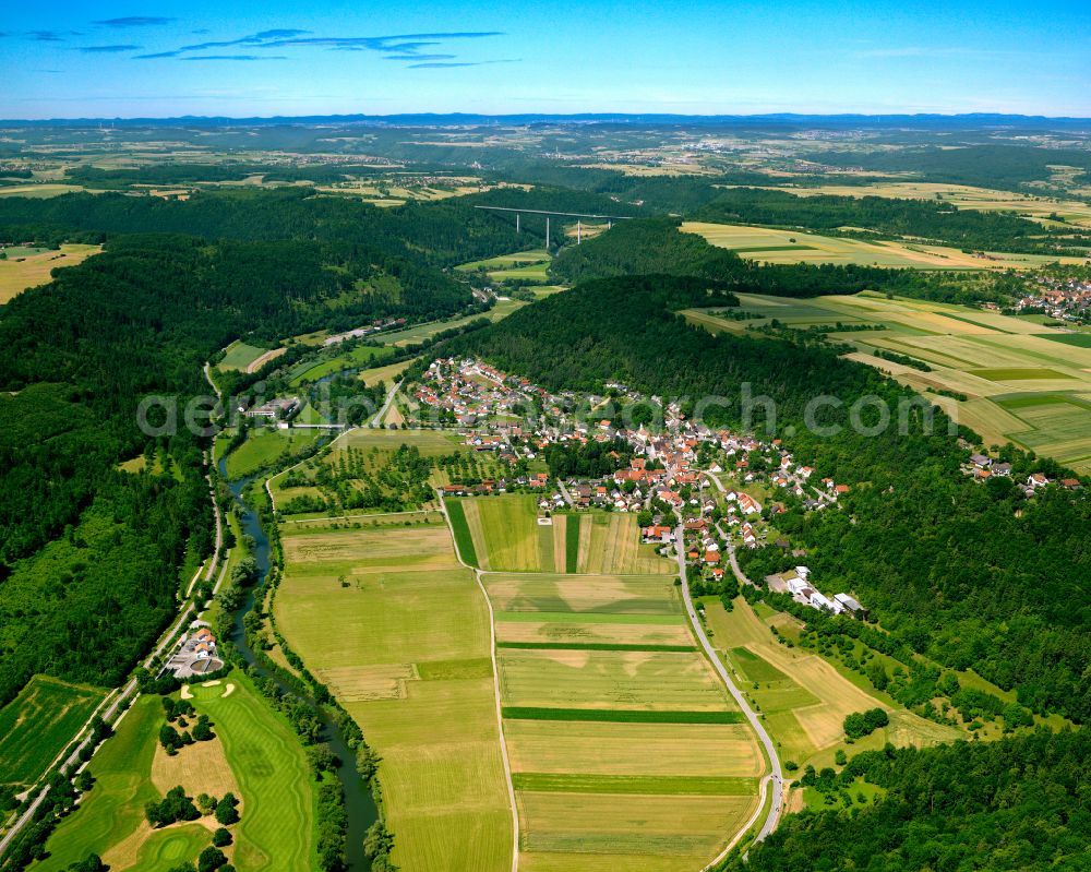 Starzach from the bird's eye view: Agricultural land and field boundaries surround the settlement area of the village in Starzach in the state Baden-Wuerttemberg, Germany