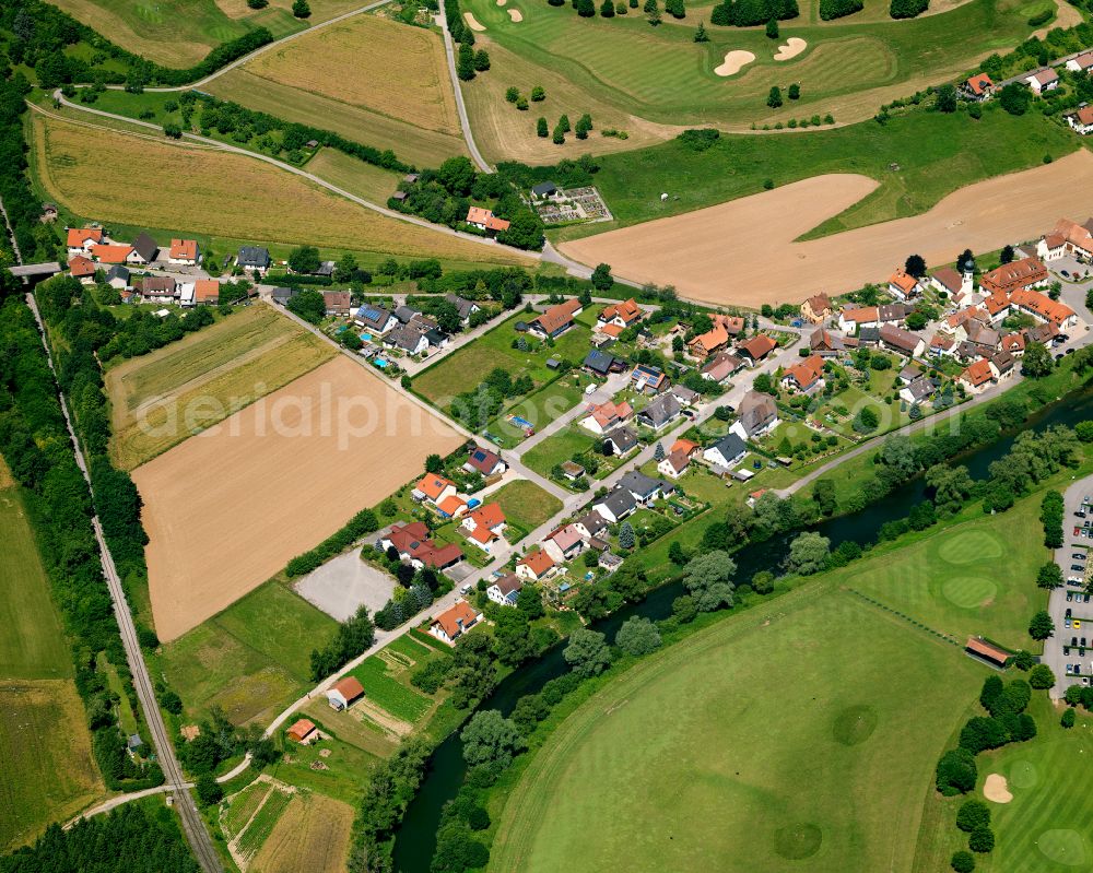 Aerial photograph Starzach - Agricultural land and field boundaries surround the settlement area of the village in Starzach in the state Baden-Wuerttemberg, Germany