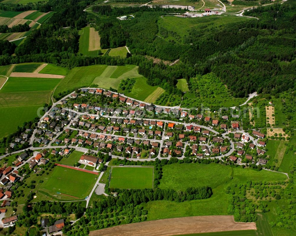 Steinbach from above - Agricultural land and field boundaries surround the settlement area of the village in Steinbach in the state Baden-Wuerttemberg, Germany