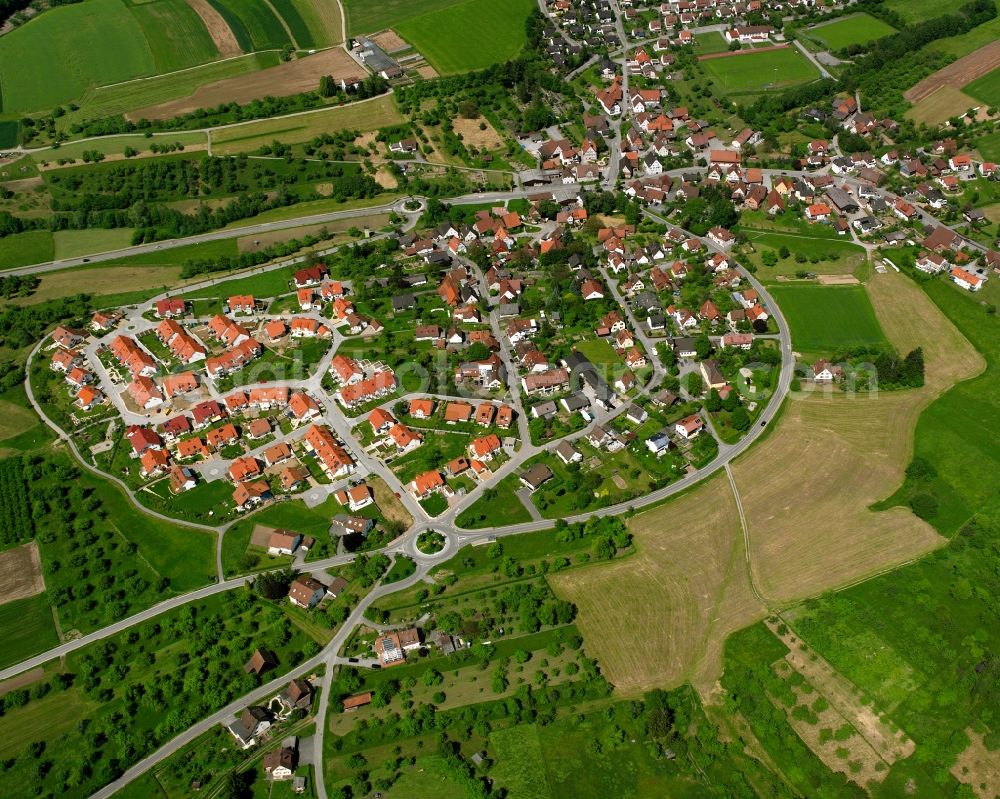 Steinbach from the bird's eye view: Agricultural land and field boundaries surround the settlement area of the village in Steinbach in the state Baden-Wuerttemberg, Germany