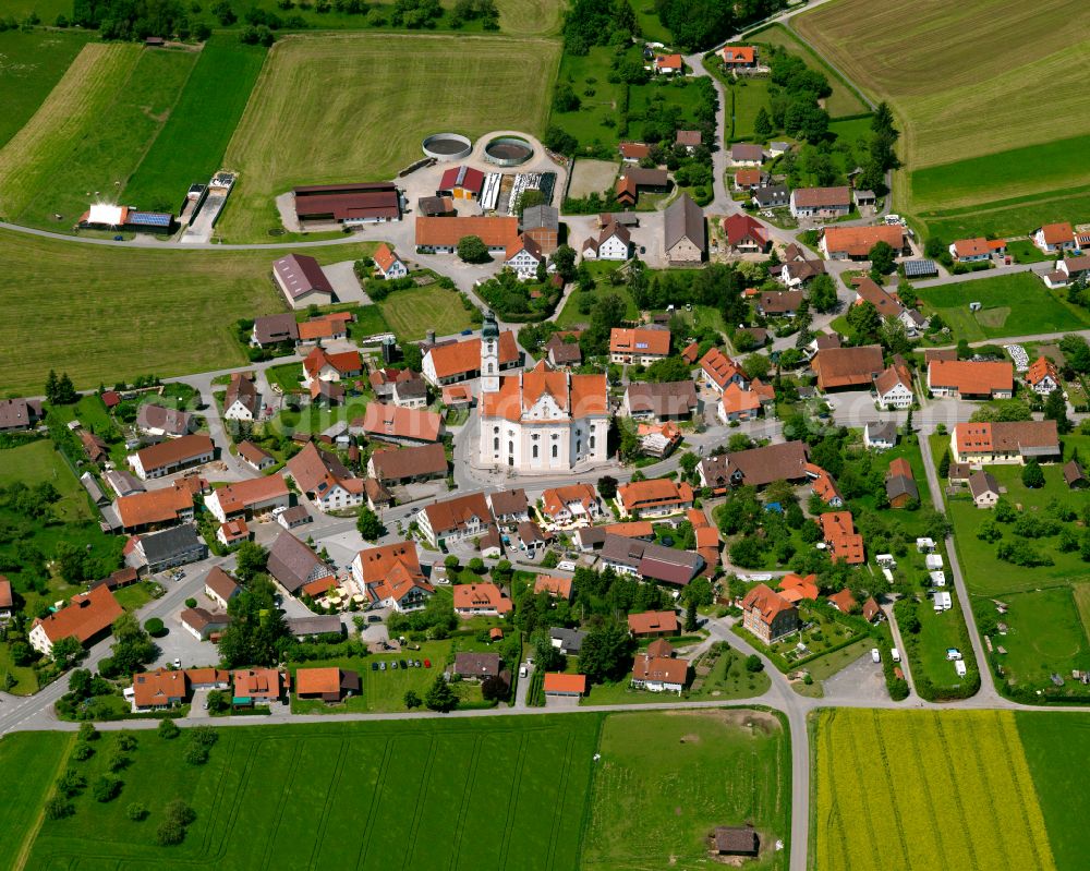 Steinhausen from above - Agricultural land and field boundaries surround the settlement area of the village in Steinhausen in the state Baden-Wuerttemberg, Germany