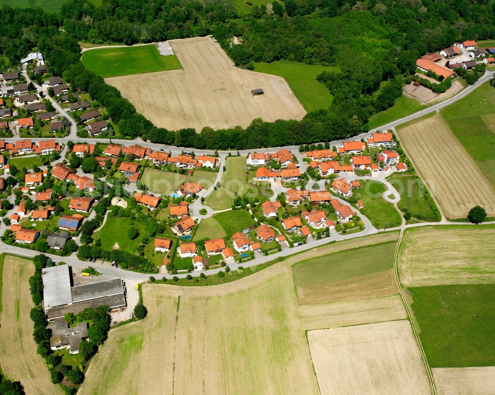 Steinhöring from the bird's eye view: Agricultural land and field boundaries surround the settlement area of the village in Steinhöring in the state Bavaria, Germany