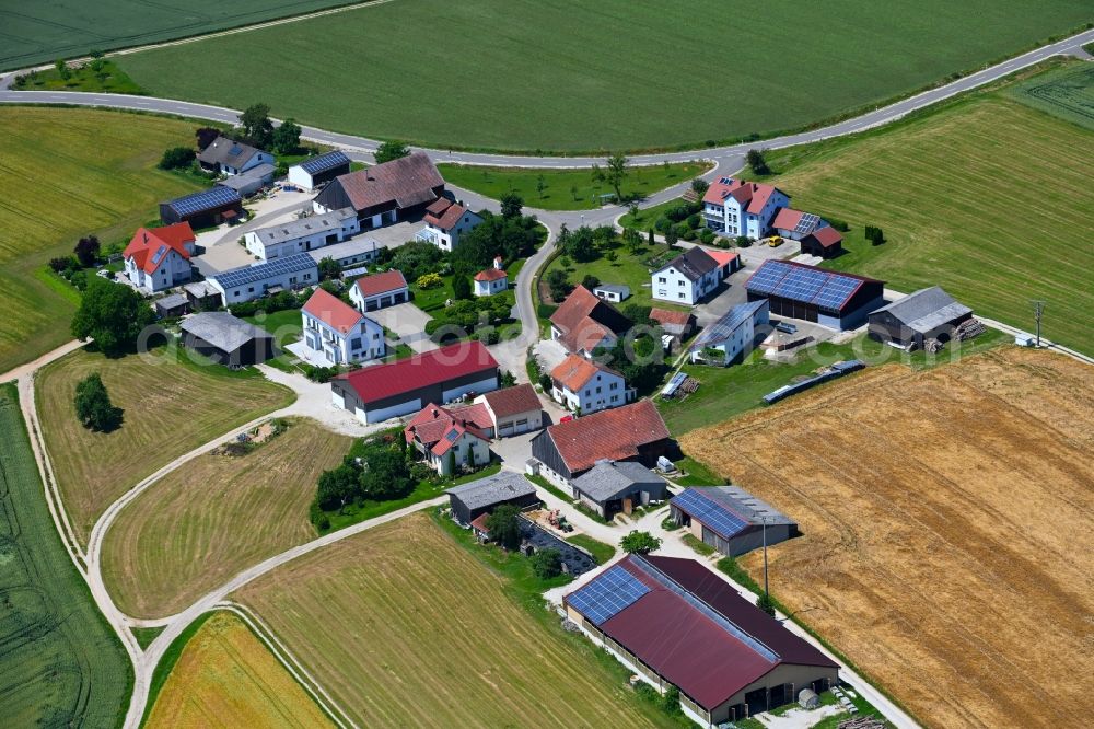 Aerial photograph Stetterhof - Agricultural land and field boundaries surround the settlement area of the village in Stetterhof in the state Bavaria, Germany