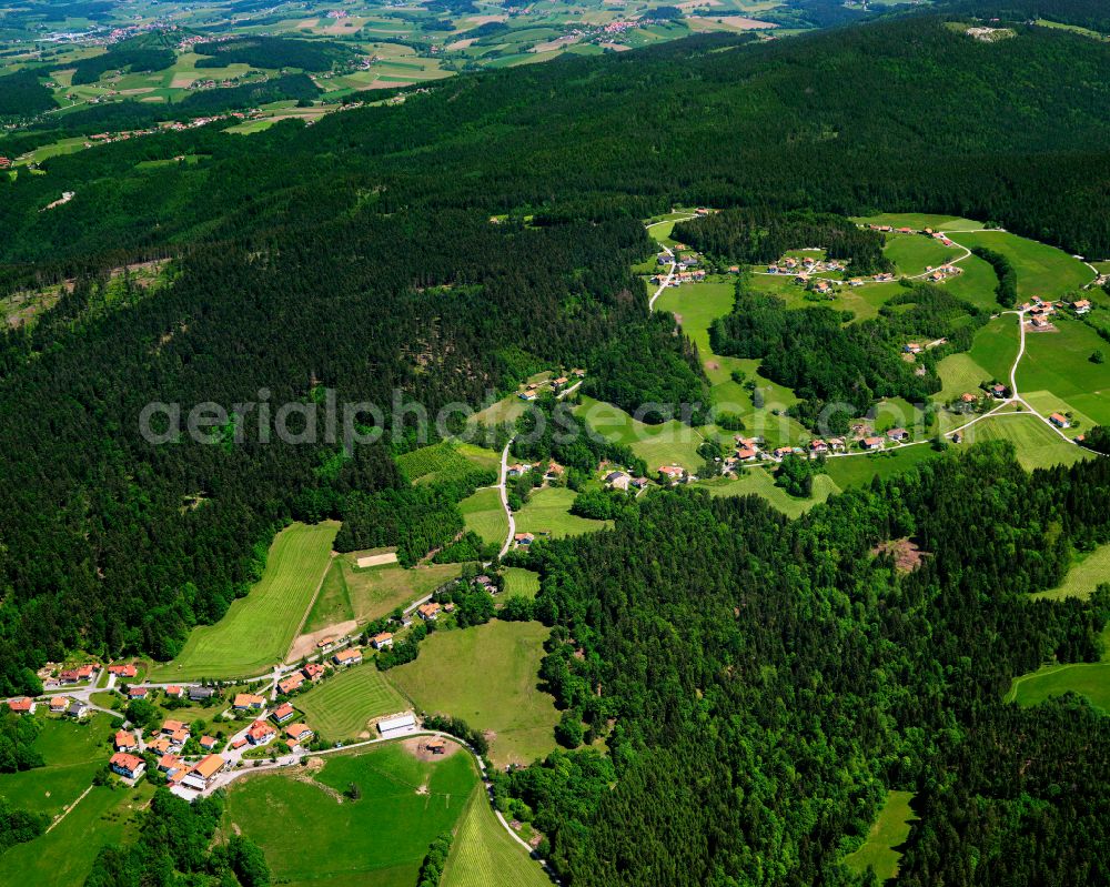 Stocking from above - Agricultural land and field boundaries surround the settlement area of the village in Stocking in the state Bavaria, Germany