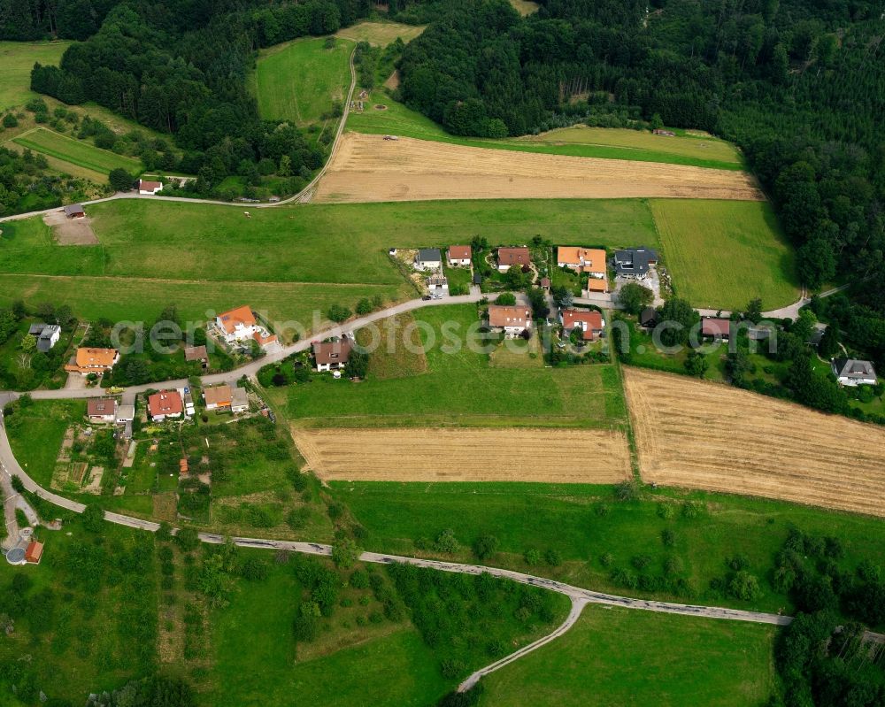 Aerial image Stocksberg - Agricultural land and field boundaries surround the settlement area of the village in Stocksberg in the state Baden-Wuerttemberg, Germany