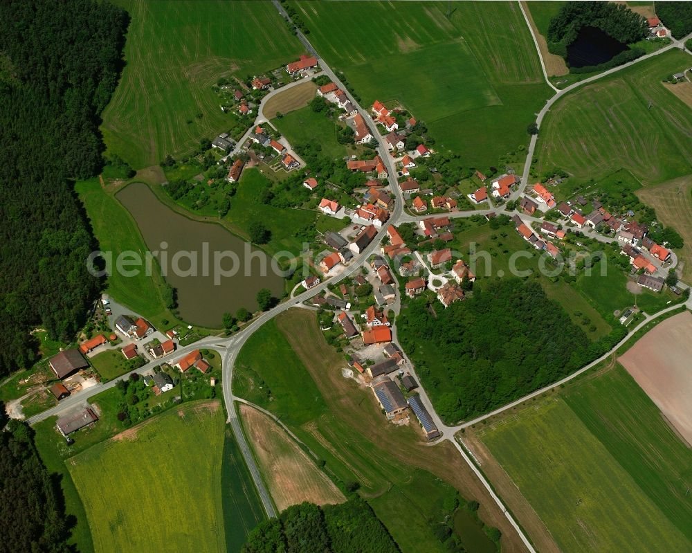 Aerial image Thürnhofen - Agricultural land and field boundaries surround the settlement area of the village in Thürnhofen in the state Bavaria, Germany