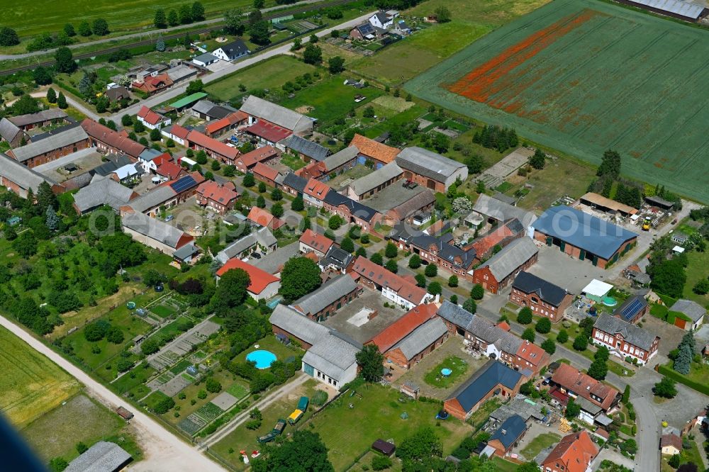 Aerial photograph Tornau - Agricultural land and field boundaries surround the settlement area of the village in Tornau in the state Saxony-Anhalt, Germany